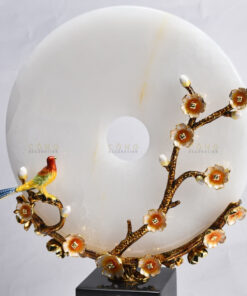 Chim khuyên đậu cành mai