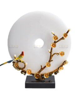 Chim khuyên đậu cành mai