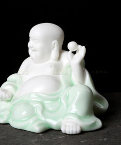 Tượng phật di lặc để xe ô tô mang lại may mắn