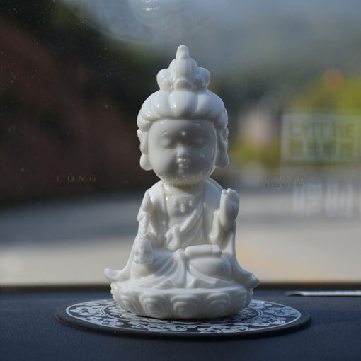 tuong-quan-am-bo-tat-de oto 1 Tượng Quan Âm Bồ Tát để trên oto