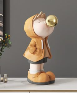 Tượng cậu bé thổi bóng