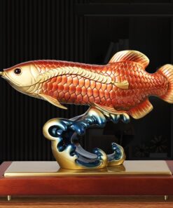 Tượng cá rồng ngậm tiền bằng đồng