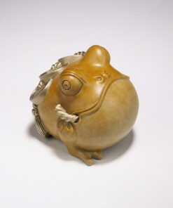 Cách đặt cóc thiềm thừ trên bàn thờ thần tài